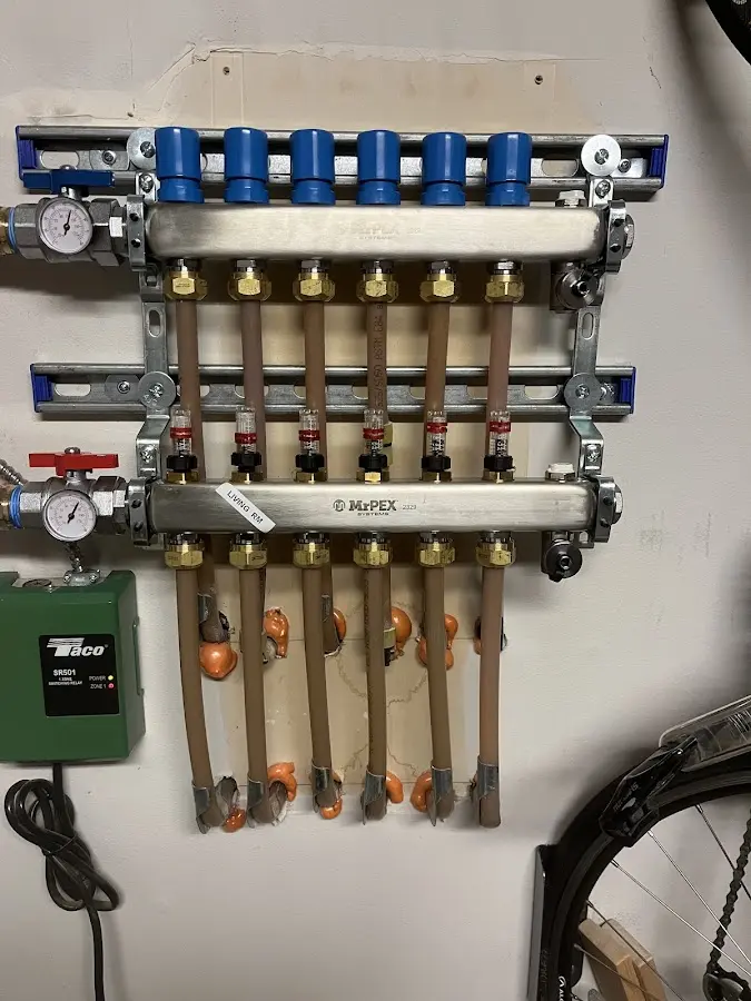 Plumber performing Water Heater Repair at a residential property in Berne